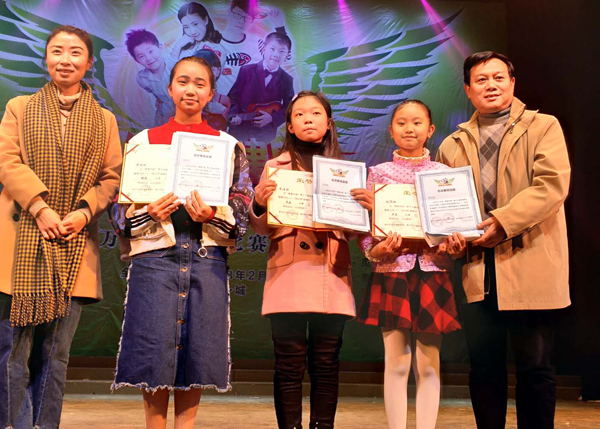 琴行学生获万州民乐大赛金奖.jpg